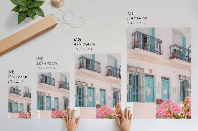 Arte de parede tons de azul pastel com detalhes de varanda e flores