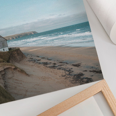Impressão em tela Praia, ondas, casa em um penhasco, cores pastel