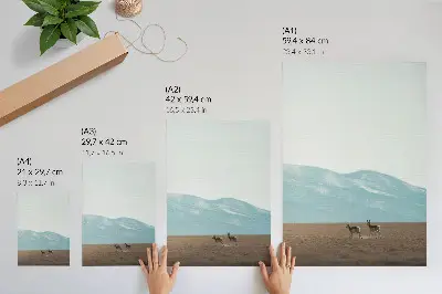 Poster para cozinha antílopes com montanhas ao fundo em um espaço tranquilo
