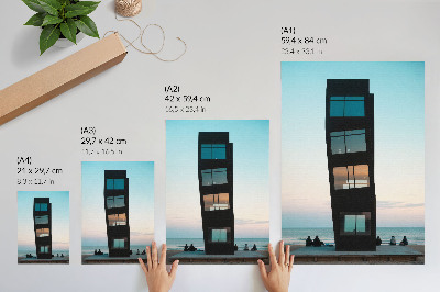 Poster decorativo Uma torre negra moderna sobre um mar azul.