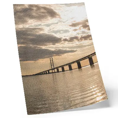Impressão em tela pintura de uma ponte sobre a água à luz do pôr do sol