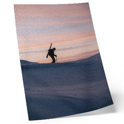 Arte de parede Esquiador contra um céu rosa em uma paisagem de inverno