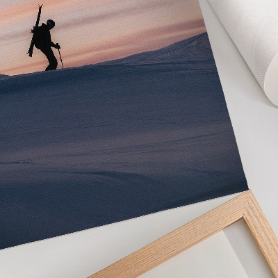 Arte de parede Esquiador contra um céu rosa em uma paisagem de inverno