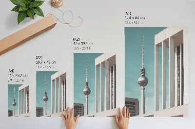 Poster decorativo Torre minimalista com edifícios modernos sob céu azul