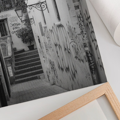Poster para cozinha Rua em preto e branco com grafites e postes de luz.