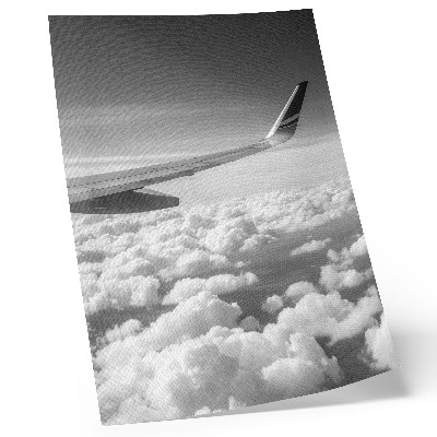 Poster decorativo Asa de avião acima das nuvens em estilo preto e branco