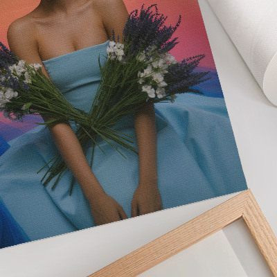 Poster decorativo Mulher com flores tendo como pano de fundo o pôr do sol.