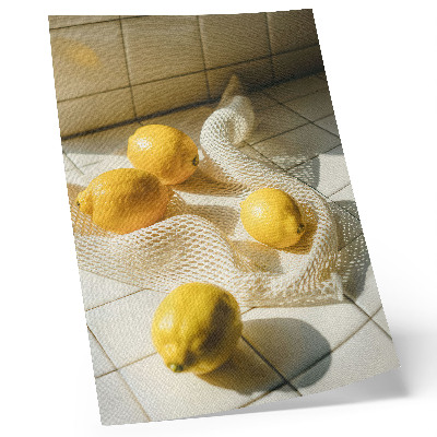 Impressão em tela Limões em uma grade de arame em um ambiente de cozinha