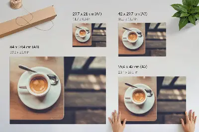 Poster mural uma xícara de café expresso sobre uma mesa de madeira