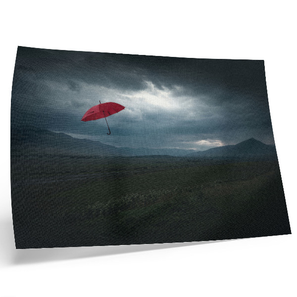 Poster em tela paisagem de montanhas com nuvens escuras e guarda-chuvas vermelhos