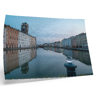 Poster em tela Prédios residenciais em tons pastel refletidos na água do canal.