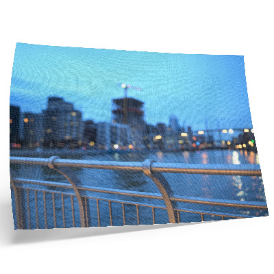 Poster mural Orla da cidade ao entardecer com luzes difusas