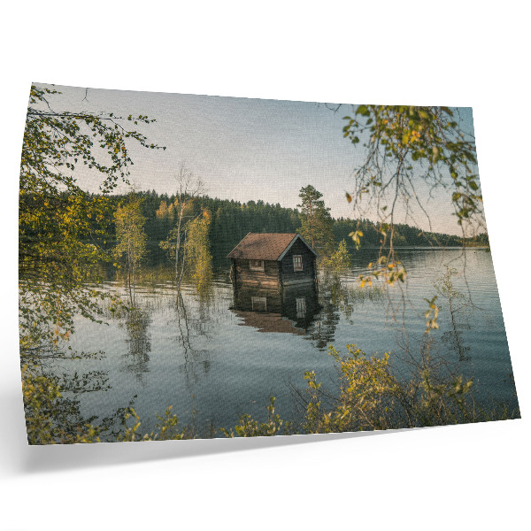 Poster Chalé à beira do lago com reflexo tranquilo das águas da floresta