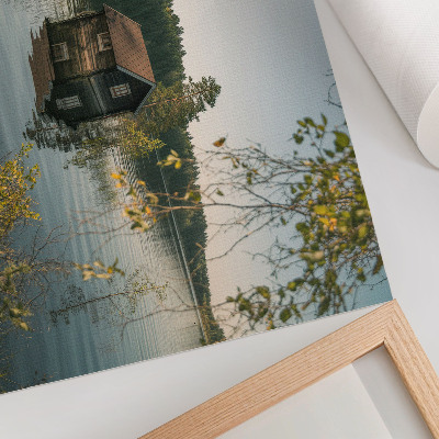 Poster Chalé à beira do lago com reflexo tranquilo das águas da floresta