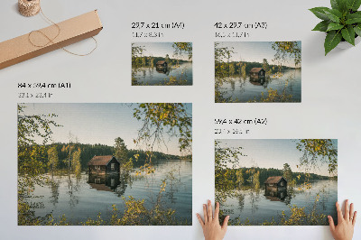 Poster Chalé à beira do lago com reflexo tranquilo das águas da floresta