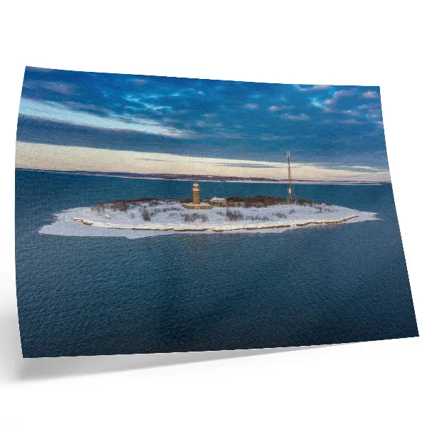 Poster mural ilha de inverno com farol e mar azul