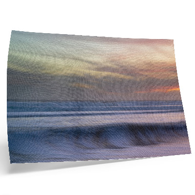 Poster mural Ondas do oceano em tons pastel e o sol se pondo.
