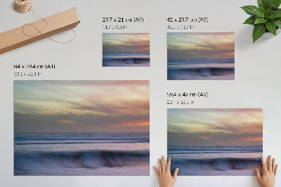 Poster mural Ondas do oceano em tons pastel e o sol se pondo.