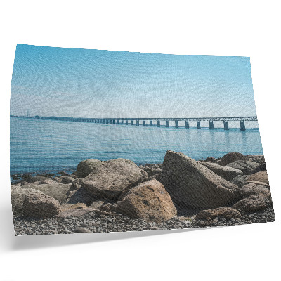 Poster em tela Ponte sobre pedras azuis na margem
