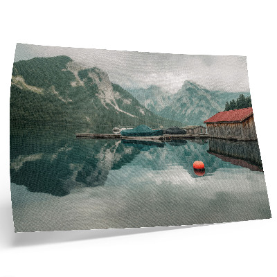 Poster reflexo tranquilo de um lago na montanha barcos de madeira