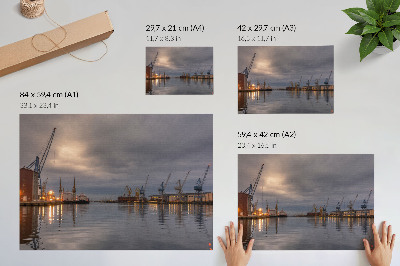 Poster em tela Guindastes portuários atmosféricos refletidos na água