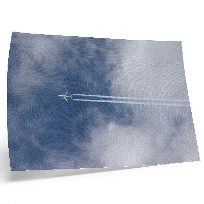 Poster mural Avião no céu azul com listras brancas