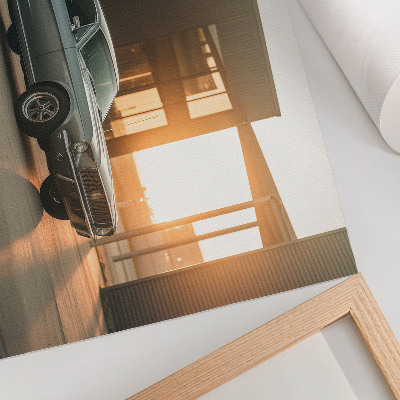 Poster em tela Um carro clássico com um cenário arquitetônico.