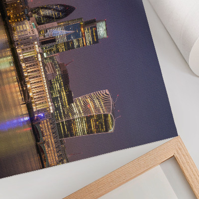 Poster em tela Arranha-céus modernos, reflexos de luzes, céu