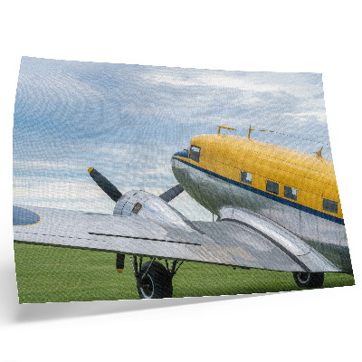 Poster Avião clássico e elegante nas cores amarelo, cinza e azul.