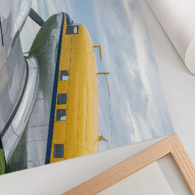 Poster Avião clássico e elegante nas cores amarelo, cinza e azul.