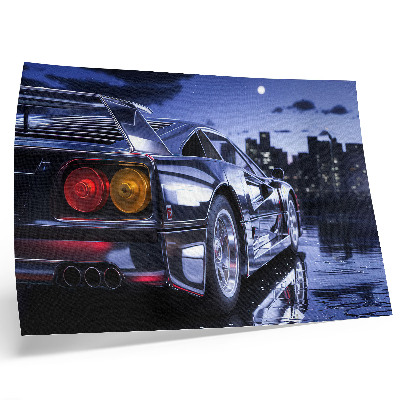 Poster para a sala Um carro esportivo em uma paisagem urbana à noite.