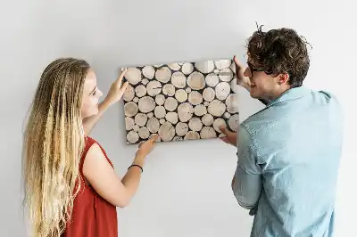 Quadro magnético para desenhar com troncos de madeira cortados