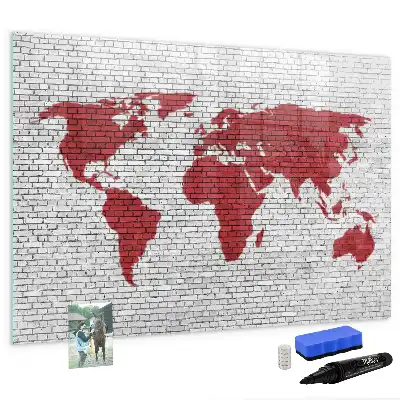 Quadro magnético para desenhar com estampa de mapa-múndi em parede de tijolos