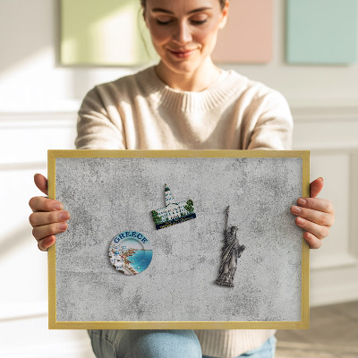Quadro magnético com moldura dourada Textura de concreto desgastada