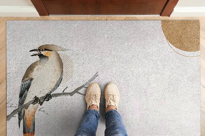 Tapete capacho Um pássaro em um galho