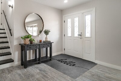 Tapete de entrada Olá no concreto