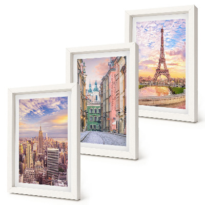 Conjunto de molduras com imagens Vista das cidades de Nova Iorque, Paris e Varsóvia ao entardecer.