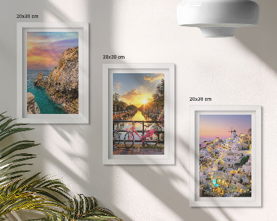 Tríptico com moldura Vista para o mar com pôr do sol e para a cidade.
