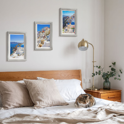 Conjunto de molduras com imagens Vistas da arquitetura paisagística da cidade de Oia, em Santorini, Grécia.