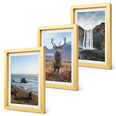 Tríptico com moldura Paisagens montanhosas com uma cachoeira, um veado e uma praia.