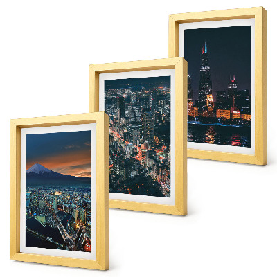 Conjunto de 3 quadros decorativos Vista da cidade à noite, com os arranha-céus ao fundo.