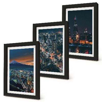 Conjunto de 3 quadros decorativos Vista da cidade à noite, com os arranha-céus ao fundo.