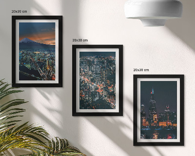 Conjunto de 3 quadros decorativos Vista da cidade à noite, com os arranha-céus ao fundo.