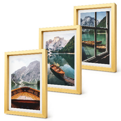 Conjunto de 3 quadros decorativos Vista de um lago de montanha com barcos e uma janela ao fundo.