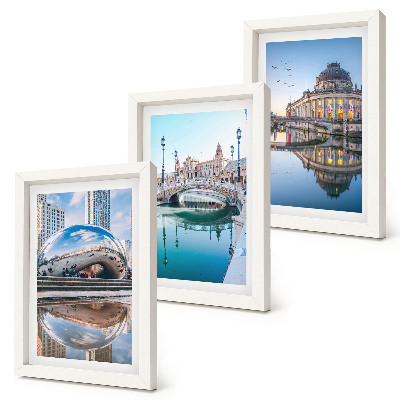 Conjunto de 3 quadros decorativos A arquitetura da cidade refletida na água.