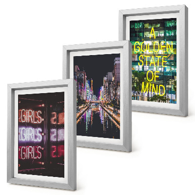 Conjunto de 3 quadros decorativos Letreiros de néon da cidade à noite com vista para o rio.