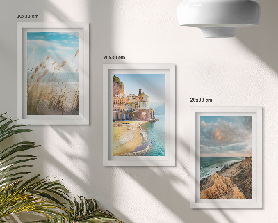 Conjunto de 3 quadros decorativos Paisagens litorâneas com praia, cidade e falésias.