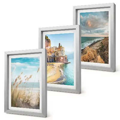 Conjunto de 3 quadros decorativos com paisagens litorâneas de praia, cidade e falésias