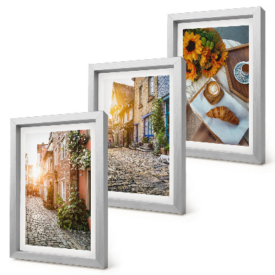 Conjunto de molduras com imagens Ruas charmosas com cafés e girassóis.