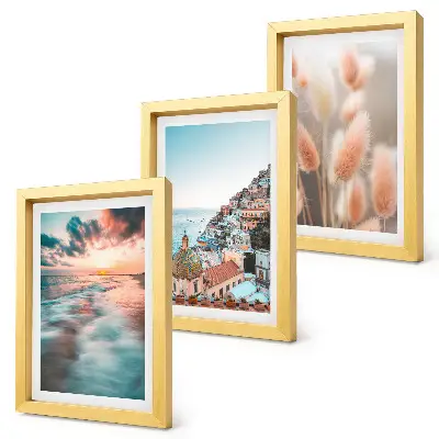 Conjunto de quadros com imagens vista para o mar com pôr do sol, casas coloridas e flores